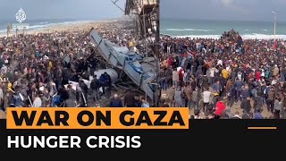 Hungry Palestinians crowd aid truck in Gaza  Al Jazeera Newsfeed [upl. by Jehiel]