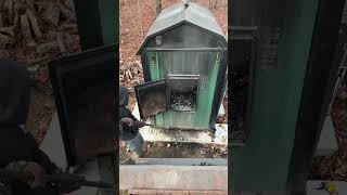 Cleaning out the wood boiler woodboiler woodstove homeheating [upl. by Aitercal]