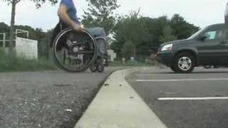 DEMO 7  Paraplegic Jumps Curbs in Wheelchair [upl. by Salas544]