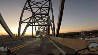 Sunset Mississippi River crossing on a motorcycle 4k POV [upl. by Airotahs17]