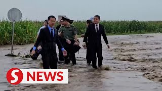 Chinas ambassador to North Korea drenched during visit to flooded county [upl. by Stacie291]