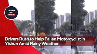 Heartwarming Moment Drivers Rush to Help Fallen Motorcyclist in Yishun Amid Rainy Weather [upl. by Demitria943]