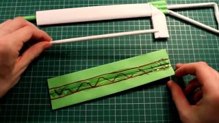 To make a paper gun Paper Machine Gun  that shoots Rubber Bands 2015 [upl. by Nowyt451]