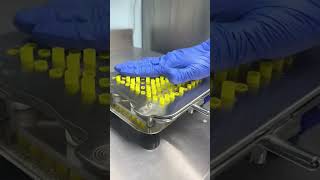 Process of Using a Specialized Tool to Fill Capsules with Powdered Medication [upl. by Atekram]