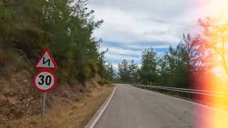 Driving over Kokkina exclave and UN buffer zone Tylliria Cyprus [upl. by Orgel]