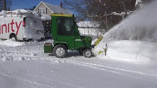 JOHN DEERE 318 WITH 49 SNOWTHROWER MOVING SNOW [upl. by Giustina]