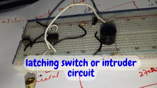 Intruder alarm circuit  latching switch sensitive circuit using 555 timer IC [upl. by Navak]