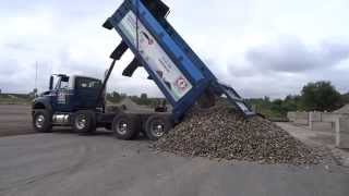 Greely Sand amp Gravel unloading a full triaxle load of river rock [upl. by Ekle]