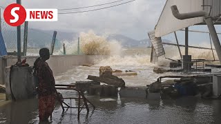 Raging waves destroy beach eateries in Butterworth [upl. by Hagar]