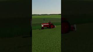 Cutting alfalfa with the 560 and the 460 farmall FarmingSimulator22 ￼ [upl. by Akcire]