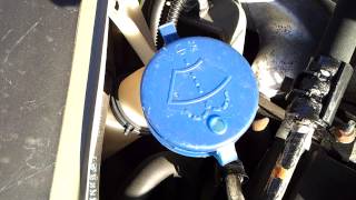 Where is the Windscreen Washer Fluid Bottle in a Citroen Picasso 2000  2009 [upl. by Lertnahs]