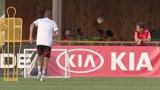 World Cup  Thomas Müllers Wayward Shot Hits Man In The FACE At Table Of Diners Germany Training [upl. by Nesyla]