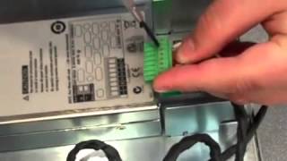 Installing a DC Power Supply Module in an Agilent N6705B DC Power Analyzer [upl. by Rohpotsirhc75]