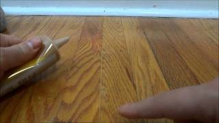 How To Fill In Gaps Between Hardwood Flooring With Wood Filler [upl. by Kyre]