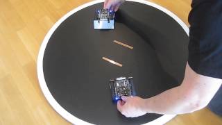 Sumo Robot Battle with two FRDMKL25Z Boards [upl. by Ednutabab70]