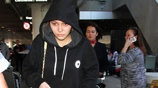 LilyRose Depp Pulls Her Hood Up At LAX [upl. by Chouest10]