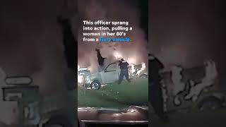 Watch this heroic officer save a woman from a burning vehicle Shorts [upl. by Asuncion337]