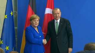 Turkeys Erdogan Pressures Germanys Merkel To Extradite Alleged Terrorists [upl. by Anowahs]