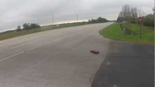 102mph Traxxas XO1 run followed by 102mph introduction to a road reflector [upl. by Elfrida695]