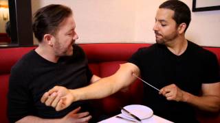 Ricky Gervais Sees Pierced Arm Real or Magic  David Blaine [upl. by Aivatra]