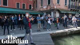 Italians dance and clap as toughest coronavirus lockdown measures lifted [upl. by Amoritta]