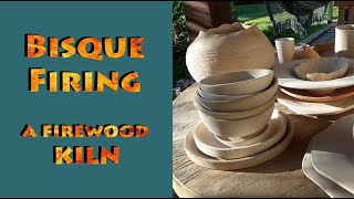 Bisque firing a wood burning Kiln [upl. by Suckram682]