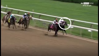 Incredible moment racehorse tries to bite rival close to finish line [upl. by Adnauqahs]