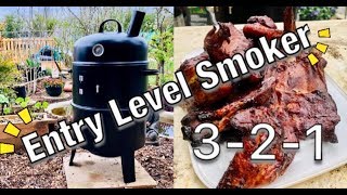 Smoking Ribs How I smoke meat on a budget upright smoker [upl. by Hiasi]