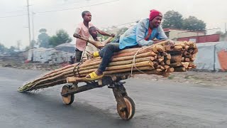 Riding Engineless Scooters on Streets of Congo [upl. by Aitsirk]