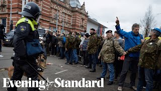 Europe Protests Thousands clash with police in Amsterdam over lockdown measures [upl. by Lu]