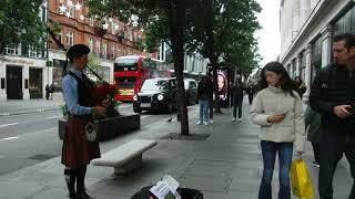 Bagpiper on Oxford Street LONDON UK [upl. by Sergeant]