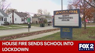 St Clair Shores house fire sends school into lockdown [upl. by Nereus93]