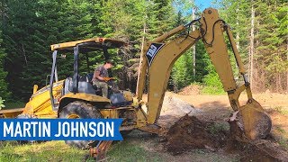 PULLING STUMPS WITH A BACKHOE  Family Builds House in the Mountains [upl. by Lexie]