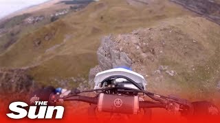 Dirt biker rides off 40ft cliff and survives Wales [upl. by Cirnek492]