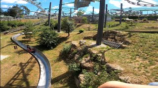 Achterbahnen Hexenbesen hängende Gondeln in fahrt im Freizeitpark Pottenstein Fränkische Schweiz [upl. by Robinet]