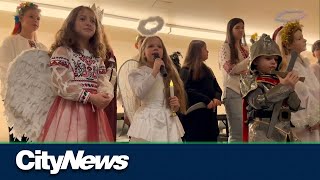 Newcomers from Ukraine celebrate the holidays through traditional carolling [upl. by Arahset]