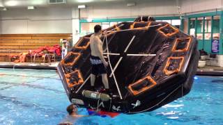 How to flip a 25man liferaft [upl. by Nnyleitak478]