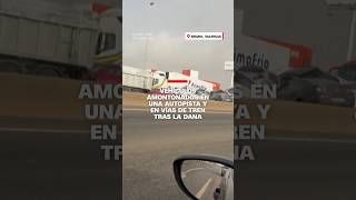 Vehículos amontonados en una autopista y en vías de tren tras la DANA [upl. by Duquette92]