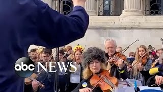 Musicians play Ukrainian national anthem in London [upl. by Nivled330]