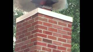 A CSIA chimney flue fire demonstration with the chimney cap on [upl. by Maribelle]