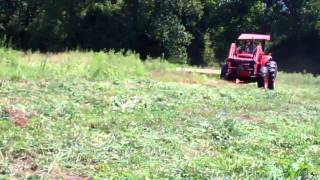 Kubota M8200 cutting hay [upl. by Shellie]