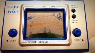 Play amp Time Space Shield lcd game watch [upl. by Nilhtac430]