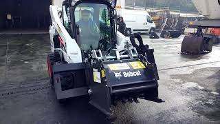 Minicarcagadora Bobcat S570 con fresadora [upl. by Eniale]