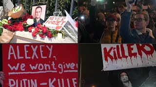 Demonstrators hold vigil for Navalny at former Russian embassy in Georgias capital  AFP [upl. by Phelps378]