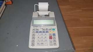 Sharp EL1750V battery powered adding machine [upl. by Nilerual]