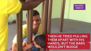 Child gets head stuck in bars leaving dad stumped [upl. by Ettenad]