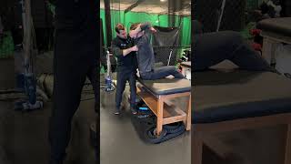 Seated Thoracic Spine Extension over quotV Grip Manual Therapy Subacromial Pain [upl. by Eelirak]