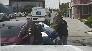 Bystanders lift car off pinned motorcyclist after crash [upl. by Anawot]