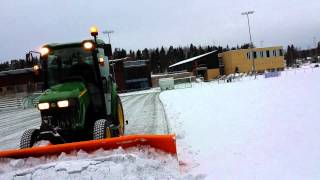 Snowplowing with John Deere 3720 [upl. by Cathi]