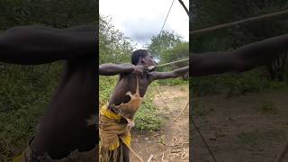 The Hadza tribe use bows and arrows to hunt their food they have been doing so for hundred of years [upl. by Helsell]